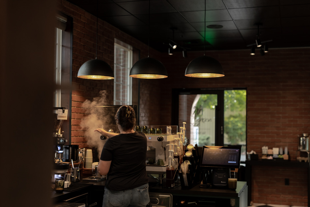 Barista preparing coffee at the Neighborhood Park + Coffee counter